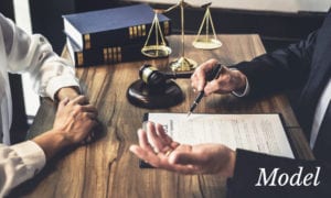 Close Up of Lawyer's and Client's Hand on Office Desk